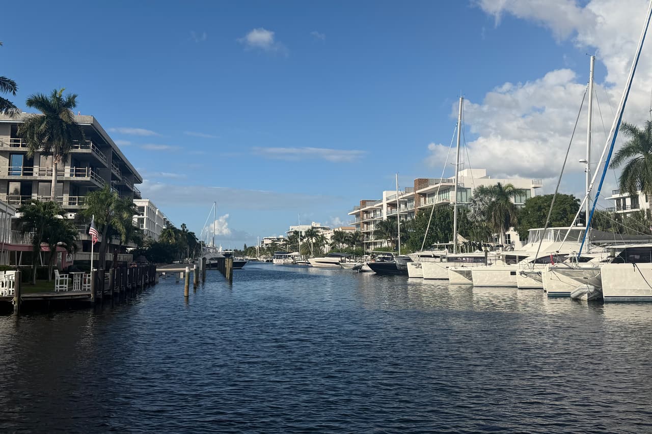 Canal in Hendricks and Venice Isles with docks, low-rise condos and a marina